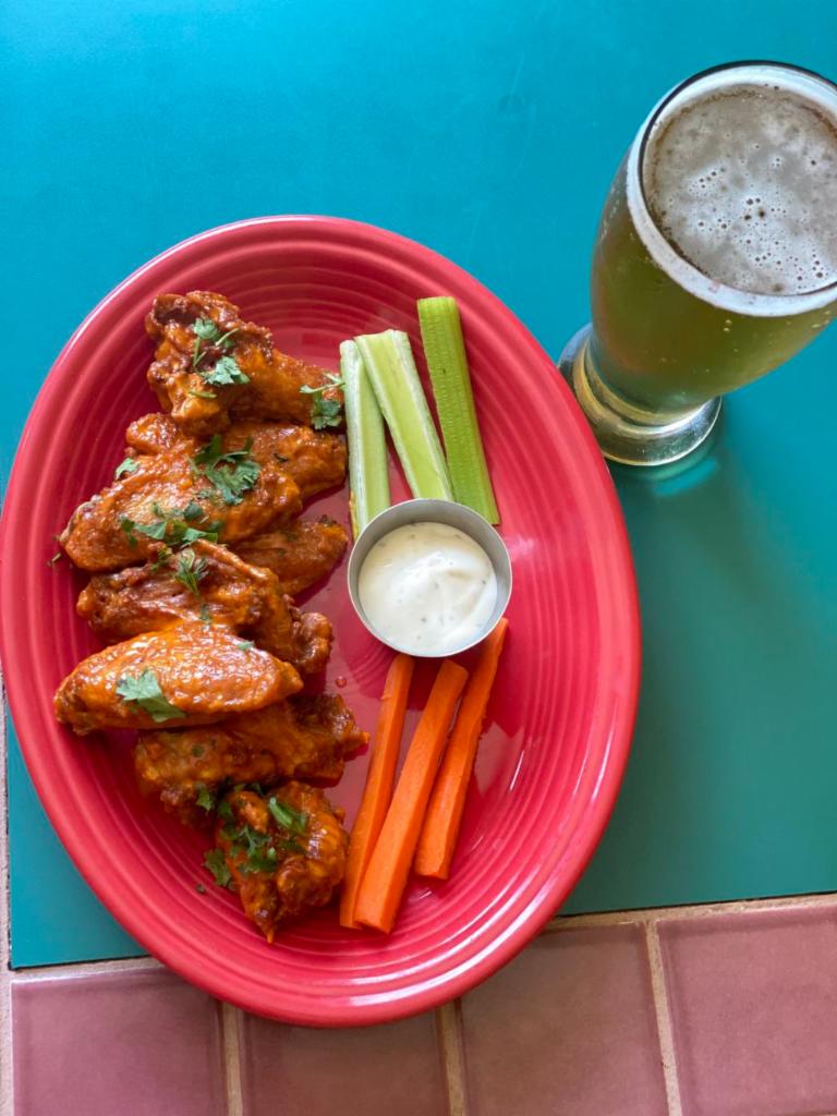 12 buffalo wings  · freshly made from scratch buffalo wings drenched in hot fire sauce made from our chefs, served with ranch celery and carrots 