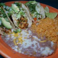 shrimp tacos · three soft corn tortillas grilled with spicy shrimp garnished with 3 slices of avocado, toma...