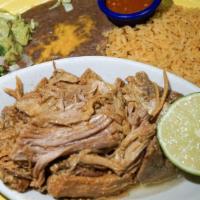 Pork Carnitas · Roasted pork meat cooked in its own juice with great flavored spices. Served with pico de ga...