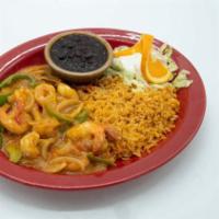 Camarones Santa Maria · Fresh prawns cooked with mushrooms, onions and mild peppers. Smothered with our very special...