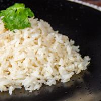 Chicken Rice (GF) · Jasmine rice steamed with Hainanese chicken stock.