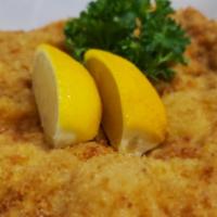 Small Schnitzel · Pork or Chicken cutlet lightly breaded and fried to golden perfection