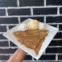 Cinnamon Sauce Crêpe · A housemade crepe topped with a generous drizzle of our sweet cinnamon sauce and crumbles of...