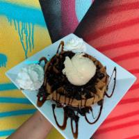 Oreo Waffle · A waffle’s favorite cookie;  this waffle comes topped with Oreo® pieces and chocolate sauce....