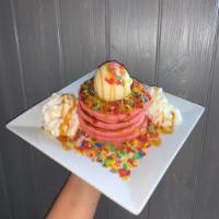 James Charles Pancakes · This rainbow treat stars Fruity Pebbles® infused pink pancakes, coated in a caramel drizzle ...