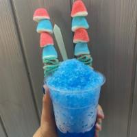 16 oz Sno Cone · A crushed ice treat flavored with one of four syrups we offer, served in a cone.