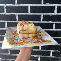 Pure Vanilla Ice Cream Cake · There’s nothing plain about this cake.  Enjoy a combination of vanilla cake & vanilla ice cr...