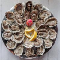 Steamed Oysters · Choice of original Cajun, garlic butter, lemon pepper, and The Hook Reel special blend.