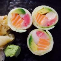 Sunset Roll · Tuna, yellowtail, salmon, avocado wrapped in cucumber with ponzu.