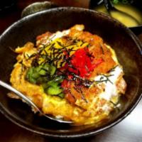 Katsu Don · Pork cutlet, mushroom, onion egg over rice. Served with soup, green salad.