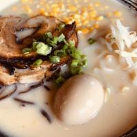 Miso Tonkotsu Ramen · Pork broth blended with miso, chashu, egg, corn, black wood ear mushroom, beansprout, and sc...
