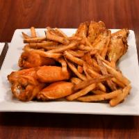 X-Wings · Jumbo organic chicken wings smothered in a choice of sauce. Served with fries.