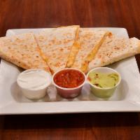 Quesadilla · Grilled flour tortilla with Monterey and cheddar cheese, tomatoes and cilantro.