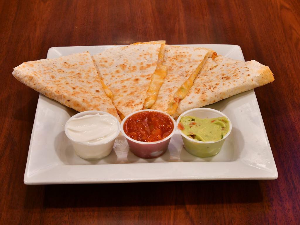 Quesadilla · Grilled flour tortilla with Monterey and cheddar cheese, tomatoes and cilantro.