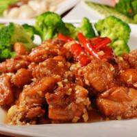 103. General Tso's Chicken 左宗鸡 · Served with white rice. Hot and spicy.
