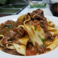 Pappardelle · Homemade pappardelle with honey braised short rib ragu. 