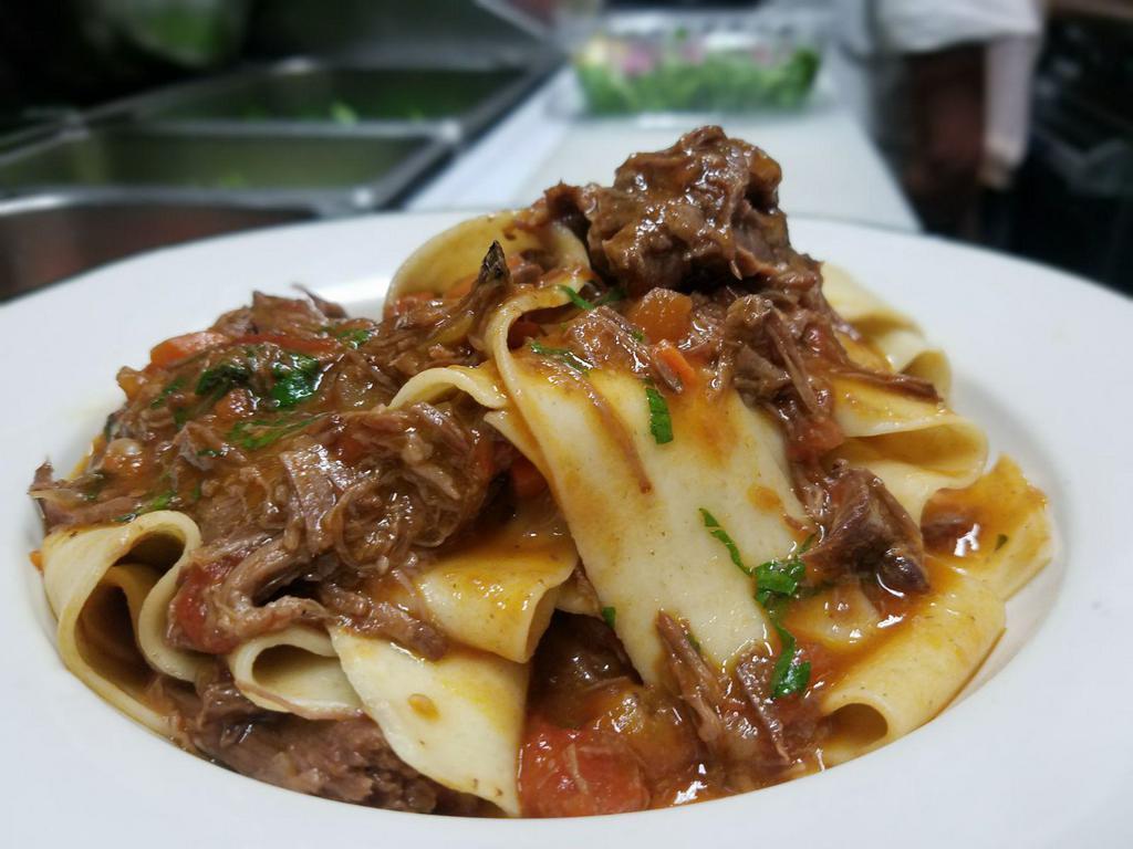 Pappardelle · Homemade pappardelle with honey braised short rib ragu. 