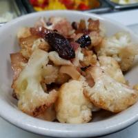 Sweet-Sour Cauliflower with Raisins and Pine Nuts · 