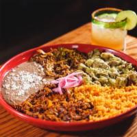 Mandiles Pork Special · Cochinita, carnitas and chili verde. Served with rice and beans.