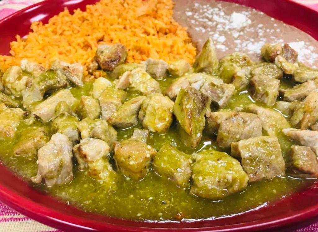 Chile Verde · Chunks of pork with a green tomatillo sauce.
