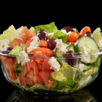 Greek Salad · Lettuce, tomato, cucumber, carrots, feta cheese, and olives with Greek dressing on the side.