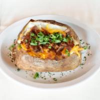 Jumbo Baked Potato · Applewood Smoked Bacon, Aged Cheddar Cheese, Chives, Whipped Irish Butter, Sour Cream