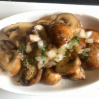 Wild Mushrooms · White Wine, Butter, Thyme