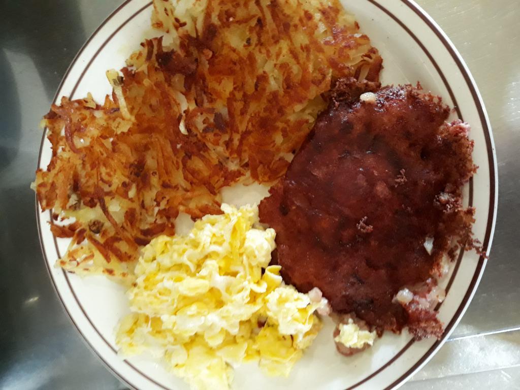 Corned Beef Hash and Eggs · hash, 2 eggs hashbrowns and toast
