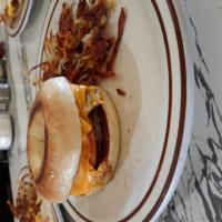 Bagel Breakfast Sandwich · Plain or onion bagel, egg and cheese sandwich, with a choice of bacon, sausage or ham. Add h...