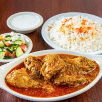 Chicken Curry · Served with rice or naan.