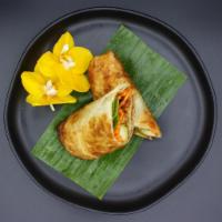 Duck Wrapped · Crispy Duck wrapped with Roti Bread, Scallion, Cucumber, Carrot and Hoisin Sauce
