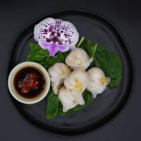 Shrimp Dumpling ·  Stemmed shrimp dumpling served with sweet black soy sauce.