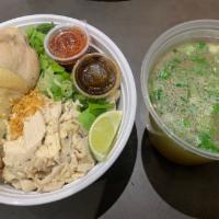 Pho Chicken · white meat chicken ,chicken broth with rice noodles topped with scallion, onion, cilantro, b...