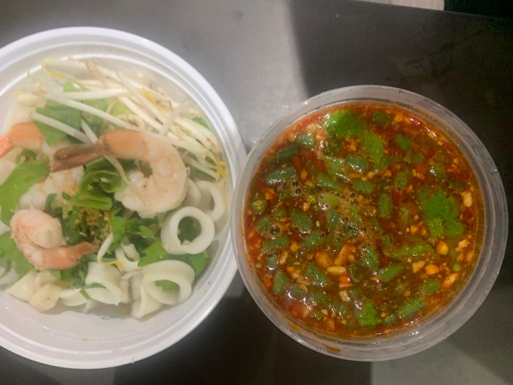 CR6. Seafood Noodles Tom Yum Soup · Rice noodles with scallion, beansprout, chopped string bean and ground peanut in spicy sour Tom Yum soup. Mediem Spicy