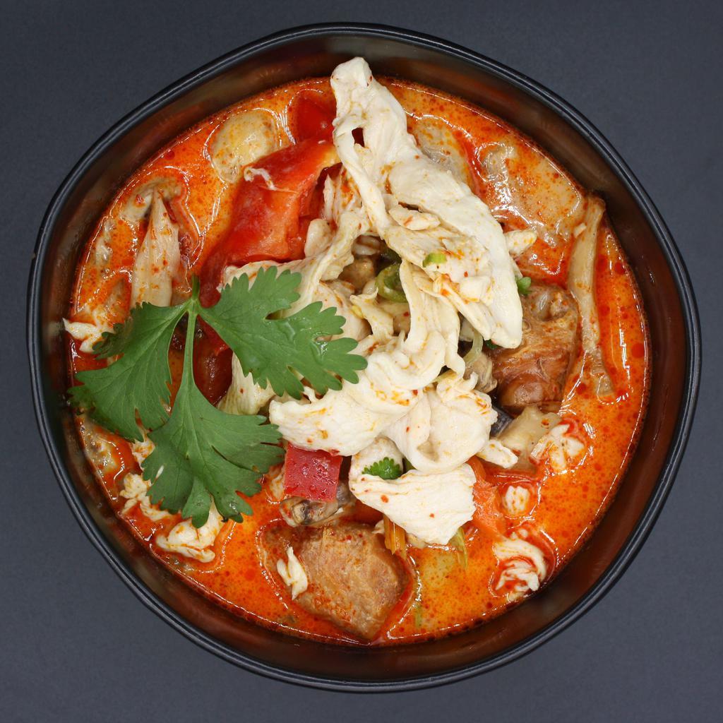 S1. Tom Yum Soup · Spicy and sour soup, mushrooms, bell peppers, lemongrass, chili and kaffir lime leaves. Medium Spicy.