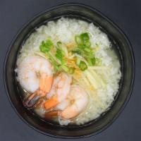 S5. Rice Soup · Thailand rice soup style with cilantro, fresh gingers, scallions and topped with fried garlic.