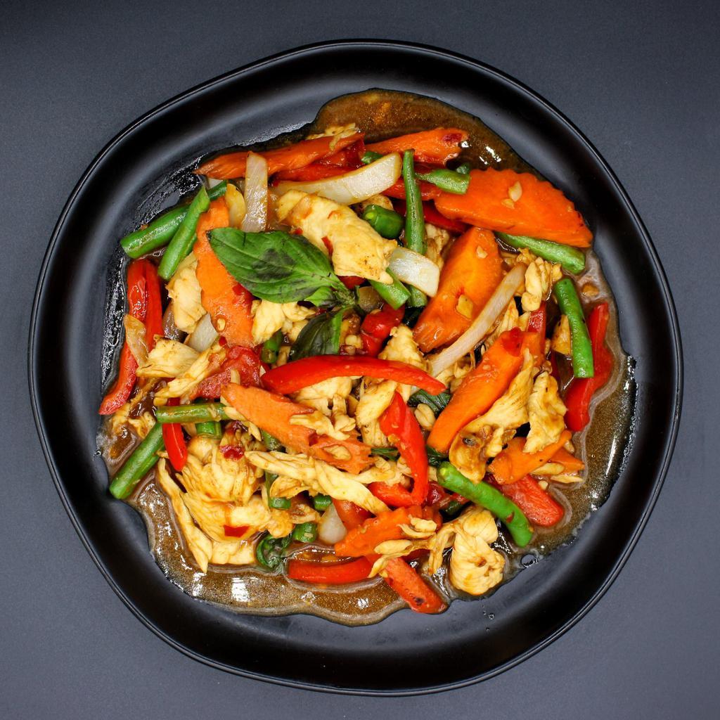 W1. Kra Prow · Classic dish with fresh basil, string beans, onion, bell peppers, carrots, in garlic basil sauce. Medium Spicy.