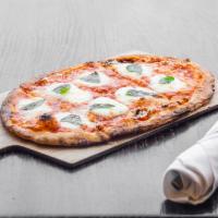 Margherita Pizza · San Marzano tomato, bufala mozzarella and torn basil.