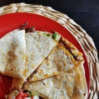 Cheese Quesadilla · Our traditional cheese filled quesadilla in an appetizer portion.