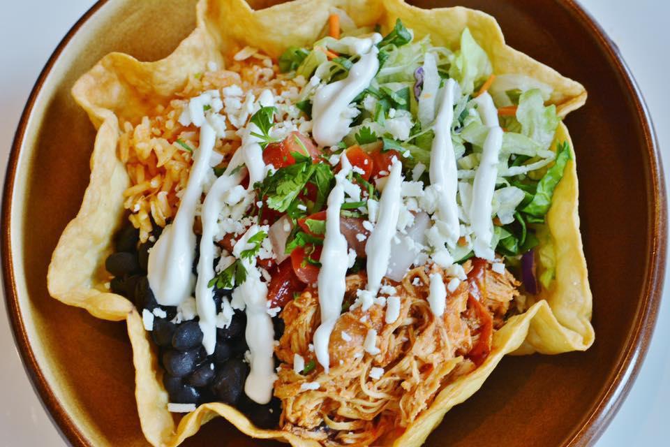 Taco Salad · Your choice of meat on rice & beans, with lettuce, tomato, onion, avocado, sour cream & queso fresco, served in a tortilla bowl