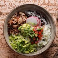 Pork Carnitas Bowl · Mesquite grilled and confit pork shoulder, romaine, black beans, cilantro lime rice, roasted...