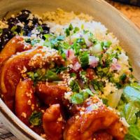 shrimp Diablo Bowl · Shrimp sauteed in Diablo chile sauce, romaine, black beans, cilantro lime rice, roasted corn...