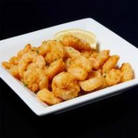 New! Fried Popcorn Shrimp.. · A healthy portion of small tender shrimp coated in a seasoned breading served with cocktail ...