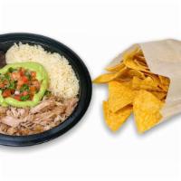 CARNITAS BOWL · Modelo Especial beer confit pork served in a delicious bowl with vegan lime rice and vegan b...