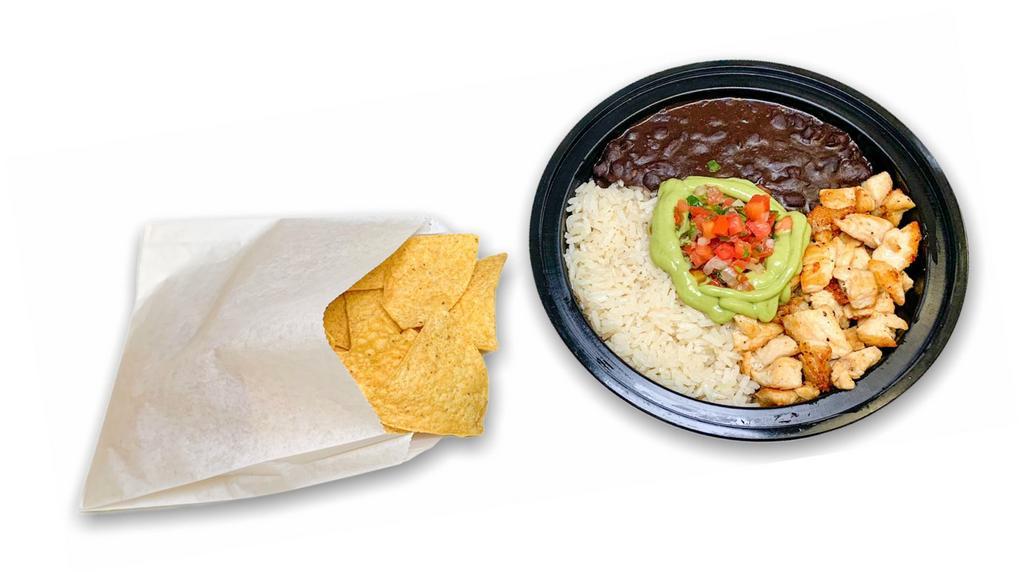GRILLED CHICKEN BOWL · Grilled chicken served in a delicious bowl with vegan lime rice and vegan black beans,  topped with avocado salsa, pico de gallo, and cilantro.  Includes a bag of tortilla chips.
