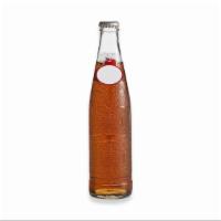 SIDRAL MUNDET · Sidral Mundet is an apple-cider flavor non-alcoholic soft drink that was first bottled in 19...