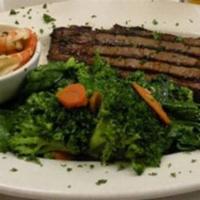 A1 Steak and Shrimp · A 1 lb. rib eye charbroiled to liking with A1 sauce accompanied with butterfly shrimp.