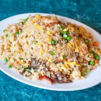 House Fried Rice · Comes with shrimp, chicken, beef, and BBQ pork. Extras for an additional charge. 