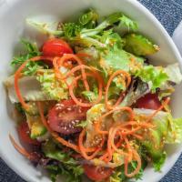 Field Green Salad · Mixed greens, served with ginger dressing.
