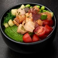 BARA CHIRASHI POKE BOWL · Ahi tuna, salmon, yellowtail, shrimp, cucumber and green onions mixed in poke sauce; served ...